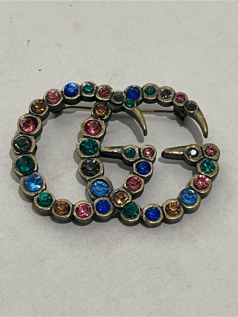 Gucci Multicolored Crystal Double G Brooch in Gold-Tone